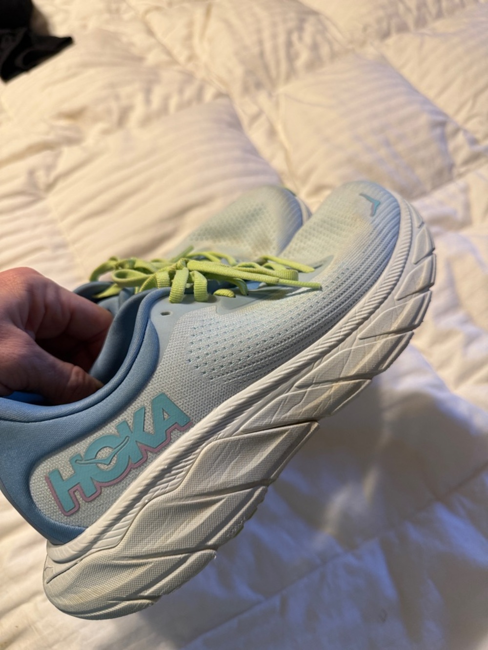 Hoka pastel blue running shoes with neon yellow laces 8.5